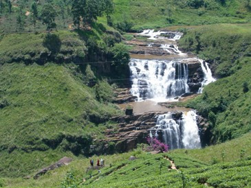 This photo of a Sri Lankan waterfall was taken by Krister Hultberg of Ockero, Sweden.  The vastness of the falls can be measured by the tiny size of the people standing in the foreground. 